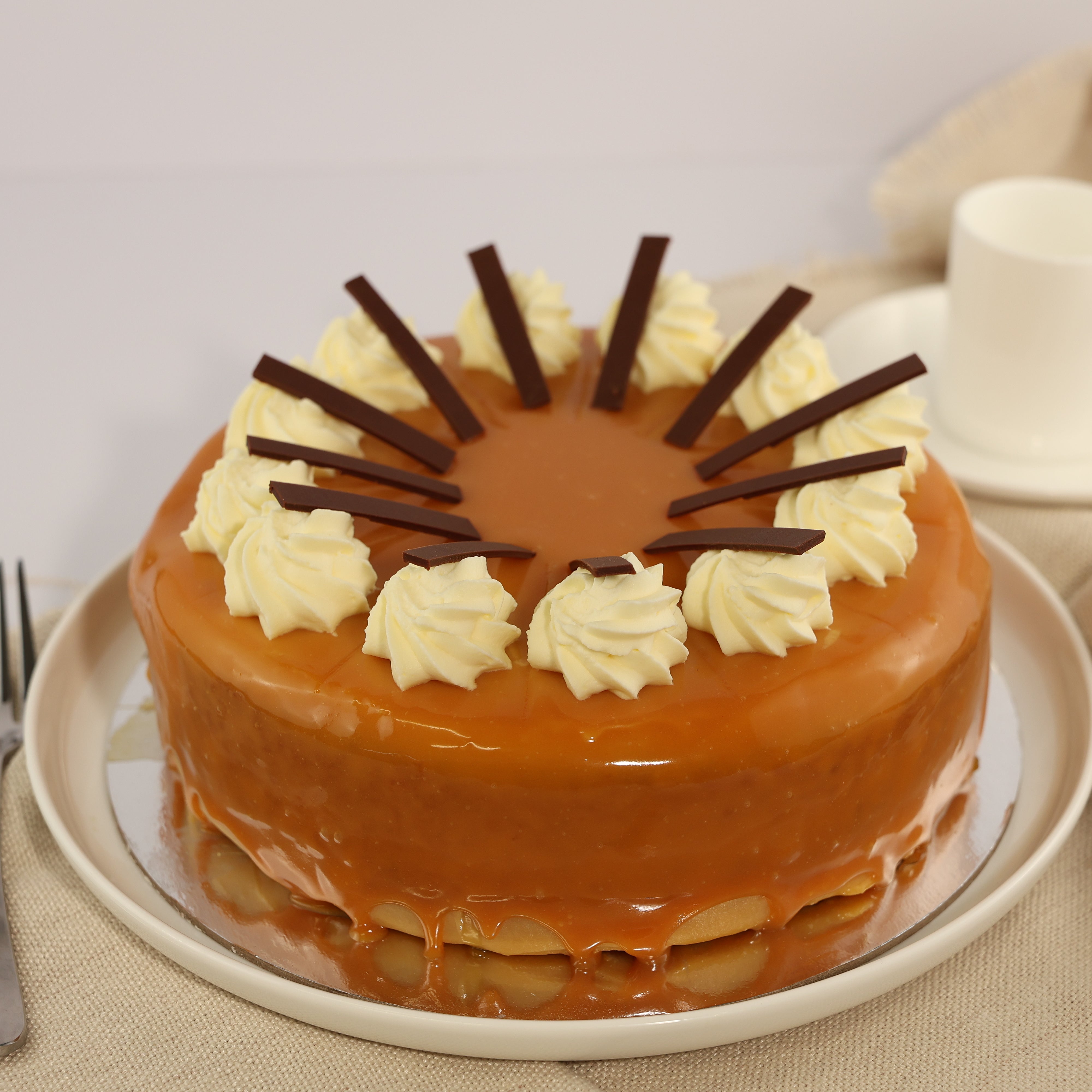 LARGE WHITE CHOCOLATE CARAMEL MUD CAKE